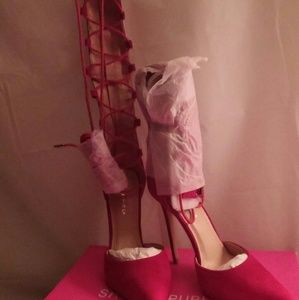 Red pointed toe tie up heel